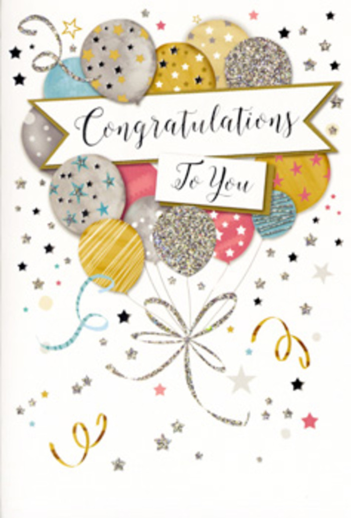 The photograph features a refined congratulations card propped upright, its entire front transformed into a scene of gentle festivity that could sit happily beside a fresh bouquet from a Romford florist's workbench. A cluster of illustrated balloons dominates the design, layered so they seem to float forward from the card in soft-focus depth. Their colours are harmoniously blended-muted gold, antique silver, champagne cream, blush pink, cool sky blue and pale grey-each balloon decorated with delicate stars, glittering dots or fine striped patterns. The subtle metallic inks give a soft sheen rather than a harsh shine, reminiscent of evening light over Raphael Park after a family celebration. Slender ribbons in shimmering gold and silver drift down in sweeping curls, visually 'tying' the balloons into a single bouquet. Through the centre, a graceful banner unfurls, carrying the message Congratulations To You in elegant script that looks hand-lettered, as if written carefully for someone special. Around the composition, tiny stars, spirals and confetti-like flecks float against a clean, pale background, suggesting the carefree energy of a surprise party or a milestone marked in a favourite Romford restaurant. The design feels both festive and sophisticated, suitable for milestones such as passing exams, work achievements, new arrivals or new homes in areas like Gidea Park or Collier Row. You can almost feel the texture variation between smooth card stock, glossy balloon shapes and slightly raised glitter, as though the card has been finished with the same attention to detail we give to a hand-tied congratulatory bouquet for same-day delivery across Romford.